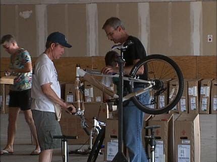Volunteers build bikes for kids in need this holiday season